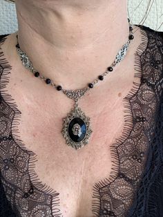 This beautiful necklace fits perfectly with any victorian outfit (or just to upgrade any t-shirt...). All metal parts are nickel free. The black faceted acrylic pearls are high quality stones. The necklace can be fastened at 37cm and at 41cm. If a longer chain is required, please feel free to contact me, we can do that! :-) Black Gothic Necklace, Victorian Outfit, Gothic Necklace, Victorian Clothing, Cameo Necklace, Cameo Pendant, Victorian Gothic, Beautiful Necklace, Long Chain