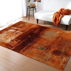 an orange area rug in a living room