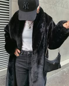 Top 10 Coats And Jackets Evey Girl Should Own Black Fur Coat Outfit Street Style, Long Black Fur Coat, Split Personalities, Black Coat Outfit