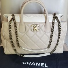 Beautiful Authentic Chanel Portobello Quilted Lambskin Logo Large Chain Strap Cc Turnlock Tote Handbag Great Looking Purse, Always Bound To Be A Stunning , Elegant And Fun Classic, Goes With Almost Every Outfit. Makes An Awesome Everyday Bag, Great For Work Or Play, Go From Business Pro To Light Fun Bag For A Night Out. Great Pre-Owned Condition. I Will Give It An 8/10 Condition Wise. Overall, Still Really Nice Looking Handbag Condition: ** Some Loss Of Shape When Empty From Storing It ** Minor White Bags With Cc Turnlock Closure For Evening, White Evening Bag With Cc Turnlock Closure, Classic White Bag With Cc Turnlock Closure, Designer White Shoulder Bag With Cc Turnlock Closure, White Leather Shoulder Bag With Cc Turnlock Closure, Elegant White Shoulder Bag With Cc Turnlock Closure, White Shoulder Bag With Cc Turnlock For Everyday Use, White Shoulder Bag With Cc Turnlock Closure, Luxury White Bags With Chain Strap