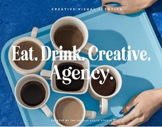 people sitting at a table with cups of coffee in their hands and the words eat drink creative