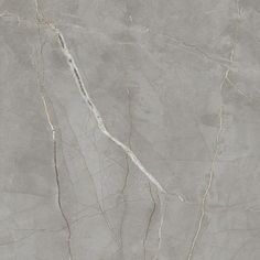 a gray marble textured surface with thin lines and cracks in the top right corner