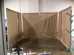 an empty room with several partitions in it