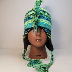 Fringed Tribal Print Hat. Nwt. Can Be Worn By Either Gender. Very Stretchy And Light Weight. Warm Adjustable Festival Hat, Funky Winter Festival Hats, Funky Adjustable Beanie Hat, Funky Winter Hat One Size Fits Most, Fun Winter Festival Hats, Funky Winter Beanie Hats, Adjustable Green Winter Hats, Fun Fitted Hat For Festival, Casual Winter Festival Hats