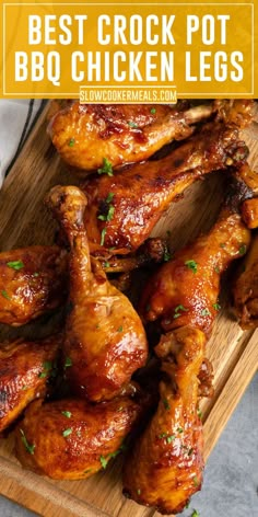 Crock pot barbecue chicken legs on a wood cutting board. Bbq Chicken Legs Crockpot, Chicken Leg Slow Cooker, Crockpot Chicken Leg Recipes, Crockpot Bbq Chicken, Bbq Chicken Legs, Slow Cooker Bbq Chicken, Bbq Chicken Crockpot, Chicken Crockpot Recipes Easy, Chicken Leg Recipes