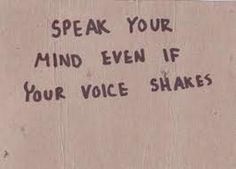 graffiti on the side of a building reads speak your mind even if your voice shakes