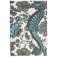 a blue and white shower curtain with two seahorses in the middle of it