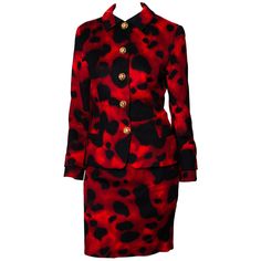 This classic red leopard print skirt suit is from Gianni Versace's Fall/Winter 1992 collection, designed by Gianni Versace. If this isn't a power suit, we are not sure we know what is. This set features a vibrant suit jacket with a matching skirt. The jacket has large gold-colored Medusa buttons featured prominently on the front; matching buttons can also be found on the cuffs. The mini skirt perfectly matches the jacket; worn together or separately, these pieces are the perfect dramatic additio Vintage Skirt Suit, Suits Outfits, Retro Suits, Red Leopard Print, Couture Skirts, Amazing Dresses, Skirt Suits, Versace Couture, Leopard Print Skirt