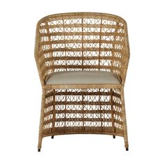 a rattan chair with a cushion on the back and seat upholstered to it