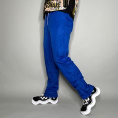 "Vintage Track Pants Royal Blue Polyester Sweatpants Baggy Fit has Ankle Zippers Augusta 90s Skate / Streetwear Great Condition: 9/10 Men's Size: Small (no tag) My Hands in Pockets = It has Pockets No Hands in Pockets = Does Not Have Pockets Drawstring Will be Visible in Forward Pic, if not Visible it Does Not Have a Drawstring About me: I am 6' 0\" for reference I generally wear a Large (32\" inseam) I Model XS to 2XL sweatpants, I find that you can often size up or down with 95% of sweatpants 90s Style Baggy Blue Pants, 90s Style Blue Baggy Pants, Urban Blue Baggy Bottoms, Hip Hop Blue Wide Leg Cargo Pants, Baggy Blue Hip Hop Cargo Pants, Blue Baggy Hip Hop Cargo Pants, Hip Hop Style Wide Leg Blue Bottoms, Blue Baggy Cargo Pants Hip Hop Style, Blue Hip Hop Cargo Pants