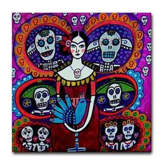 a painting with skulls on it and a woman holding a cross in front of her