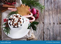 hot chocolate with marshmallows and christmas decorations