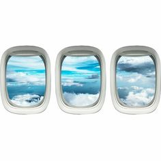 three windows with clouds and blue sky seen from inside an airplane's window sill