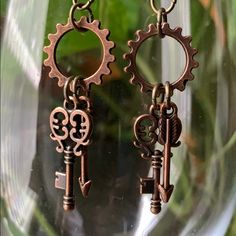 Handmade By Me, Bronze Colored Earrings With A Gear, Key And Arrow. Posts Are Lead Free. Earrings Are 2 1/2 Inches Long Gear Earrings, Colored Earrings, Free Earrings, Earrings Color, Bronze Color, Long Earrings, Diy Jewelry, Jewelry Earrings, Size 2