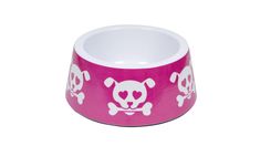 a pink and white dog bowl with skulls on it