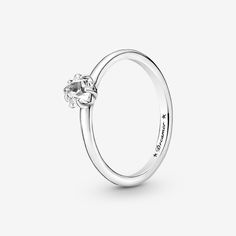 Bring starry sparkle to your outfits with the Celestial Sparkling Star Solitaire Ring. Inspired by celestial beauty, the sleek sterling silver ring features a center star-shaped clear cubic zirconia stone and is complemented by two asymmetric stars and the word "Dreamer" engraved inside the shank. The dazzling design looks equally stunning worn on its own or layered with contrasting Pandora rings in different metal tones. A classic and sophisticated addition to any collection. - Pandora Celestial Sparkling Star Solitaire Ring - Sterling silver / Cubic Zirconia / Clear - Sz. 7 Pandora Promise Rings, Pandora Celestial, Pandora Stackable Rings, Xmas List, Sparkling Stars, Pandora Rings, Jewellery Uk, Birthday Wishlist, Halo Rings