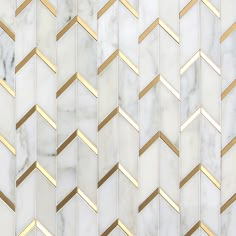 a white marble and gold herringbone pattern with metallic lines on the sides, in an abstract manner