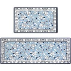 two blue and white place mats with floral designs