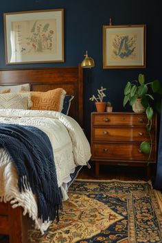 a bed room with a neatly made bed and a rug on the floor next to it