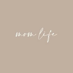 the word, now life written in cursive writing on a beige background with white ink