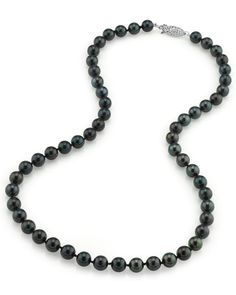 a black pearl necklace on a white background