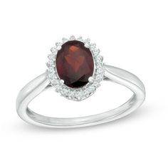 Chic and simple, this dazzling gemstone ring is an exquisite keepsake for the January birthday girl. Crafted in cool 10K white gold, this distinctive look features an 8.0 x 6.0mm oval-shaped regal red garnet surrounded by a luminous frame of lab-created white sapphires. Below, shimmering filigree designs lend dimension to choice, while a gently pinched shank completes the style. Beautiful with a brilliant buffed luster, this ring reminds her just how much you adore her. Zales Engagement Rings, Zales Zales, Frame Ring, January Birthday, Filigree Pattern, Garnet Stone, Filigree Design, Sapphire Stone, Red Garnet