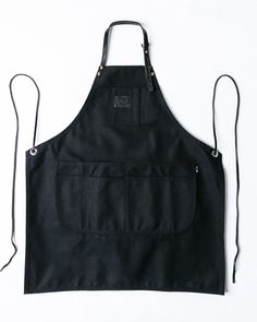 the apron is black and has two pockets