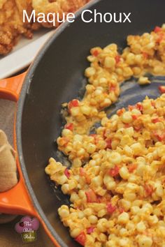 a pan filled with macaroni and cheese on top of a table