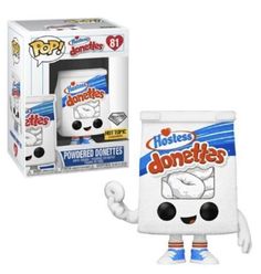 a pop vinyl figure is in front of a box with the word donuts on it