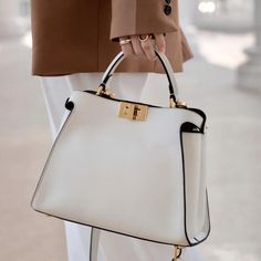 Buy White Leather Top Handle Middle-Size Satchel Metal Lock Shoulder Bags Worldwide Free shipping and return, color: White , material: Genuine Leather Structured Bag Classy, White Hand Bag, White Leather Bag, Trendy Purses, Fendi Peekaboo, Bag Women Fashion, Stylish Handbags, Elegant Bags, White Handbag