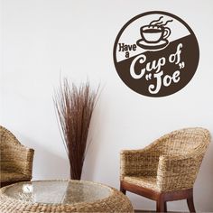 there is a wall sticker that says have a cup of joe