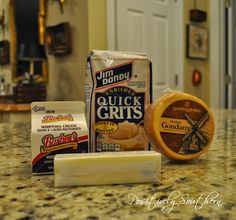 ingredients for making cheesecakes sitting on a kitchen counter