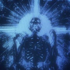 a skeleton sitting in front of a cross with his hands on his hips and eyes closed