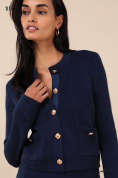 From the sweetest on campus to the cutest at brunch, the Lulus Most Adorable Vibes Navy Blue Button-Front Cardigan Sweater Top always does the trick! Cozy sweater knit shapes this cardigan top with a crew neckline and long sleeves. The slightly cropped bodice boasts a functional, gold embossed button placket at the center and two patch pockets with matching decorative buttons. Ribbed knit accents the neckline, cuffs, pockets, and hem. Pair with the matching skirt for a complete look! Fit: This garment fits true to size. Length: Size medium measures 19" from shoulder to hem. Bust: Great for any cup size. Waist: Loosely Fitted. Fabric: Fabric is very stretchy. Unlined. 100% Acrylic. Hand Wash Cold. Do Not Bleach. Line Dry. Iron Low Heat. Imported. Lulus | Most Adorable Vibes Navy Blue Button Preppy Fall Cardigan For Workwear, Preppy Fall Cardigan For Work, Fall Preppy Workwear Cardigan, Preppy Buttoned Tops For Fall, Casual Formal Dresses, Navy Blue Cardigan, Lulu Fashion, Navy Blue Sweater, Button Front Cardigan