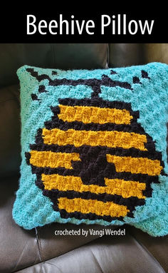 Crochet beehive pillow in bright yellow and black stripes with a blue background, made with the corner-to-corner technique. Bee Pillow, Crochet Pattern Written, Pillow Crochet Pattern, C2c Crochet Pattern, Beehive Design, C2c Graph, Minimalist Pillows, Black And White Words, Pillow Patterns