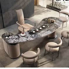 a marble table with chairs around it