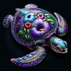 a turtle with flowers painted on it's back and wings, sitting in the dark