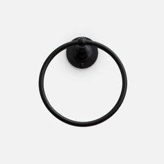 an image of a black towel ring on a white background with space for your text