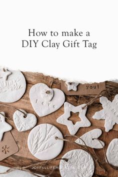 white clay christmas ornaments on a wooden board with text overlay how to make a diy clay gift tag