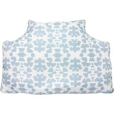 a blue and white pillow with flowers on it's side, in front of a white background