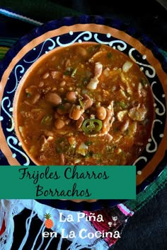 a bowl of chicken tortilla soup on a blue and orange plate with the words frigles charros borrahas