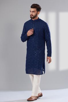 Navy blue kurta with intricate chikankari floral patterns and sequin work embroidery. Comes with a pant. - Aza Fashions Sequin Work Embroidery, Floral Kurta For Men, Navy Blue Kurta, Wedding Kurta For Men, Kurta Set For Men, Blue Kurta, Types Of Work