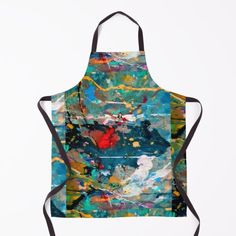 an apron that has been painted with different colors and patterns on it, including blue, red