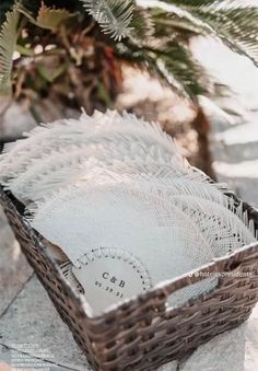 a wicker basket sitting on top of a stone slab