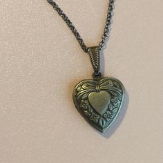 These engraved heart shaped lockets can ship tomorrow. The antique silver lockets can open and close (they are photo ready lockets.) If you like dark silver jewelry, this might just be your locket.  Each locket comes on a 15 inch silver-ox chain with a matching 3 inch (7.5 mm) chain extender.  Like everything else here in HollysPrivateIdaho, they were made with love in a smoke-free home. Vintage Heart Locket Necklace For Mother's Day, Vintage Engraved Heart Necklace For Mother's Day, Vintage Style Engraved Heart Necklace For Mother's Day, Vintage Double Heart Engraved Necklace, Vintage Memorial Locket Necklace For Mother's Day, Vintage Double Heart Engraved Locket Necklace, Vintage Silver Locket Necklace For Mother's Day, Engraved Metal Locket Necklace For Wedding, Vintage Heart Locket Necklace Nickel Free