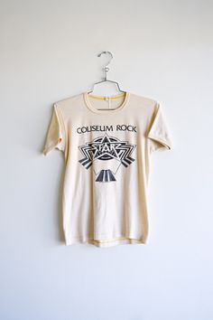 70s cream starz band tee light pilling front graphic  13.5 inch shoulder 15.5 inch across armpit 23 inch length 6 inch sleeve  color: cream era: 70s likely poly blend care: machine wash cold: tumble dry low 1970s Tshirt, Vintage Rock Tees 70s, 1970s Tshirts Vintage 70s, 1970s Band Tshirt, 70s Ringer Tee, Band T Shirts, Band Tees, Vintage 70s, Favorite Outfit