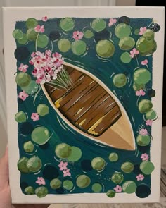 a painting of a boat floating on water surrounded by lily pads and pink flowers in the foreground