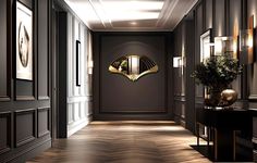 an elegant hallway with dark walls and wood flooring