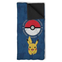 the pokemon pikachu blanket is laying on top of a blue bed sheet with an image of a pokeball