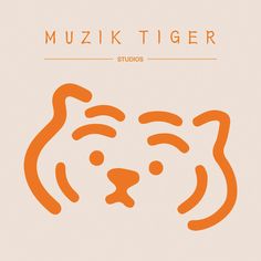 an orange tiger's head with the word muzik tiger on it